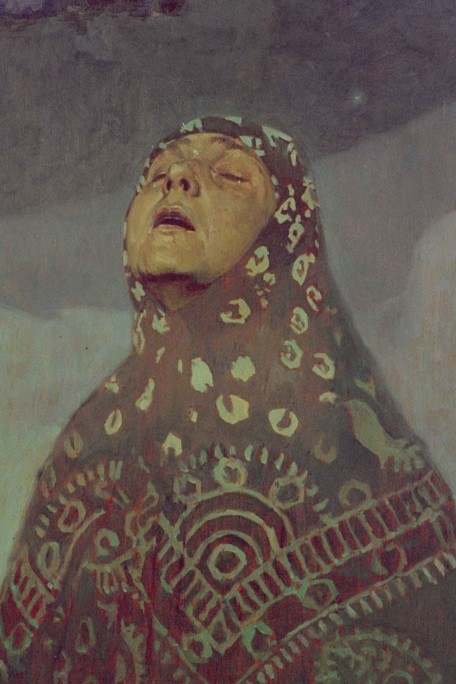 A close-up of a Russian peasant woman with her moonlit face looking up towards the sky