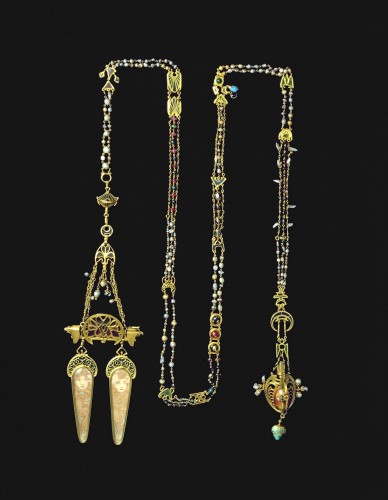 Ornate chain encrusted with pearls and semi-precious stones with a double pendant with two representations of female heads with swirling hair on elongated ivory panels