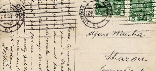 Verso of a postcard with Czech stamps and handwriting in Czech