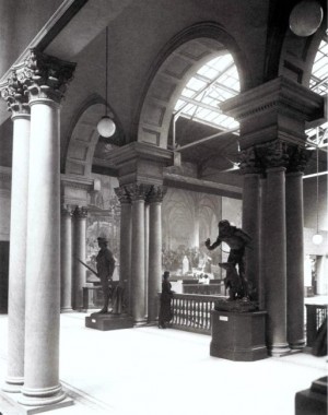 Installation of the Slav Epic canvases in the Gunsaulus Hall of the Art Institute of Chicago, 1920 Interior view from an arched walkway of one of Mucha's Slav Epic canvases in situ under a glass ceiling