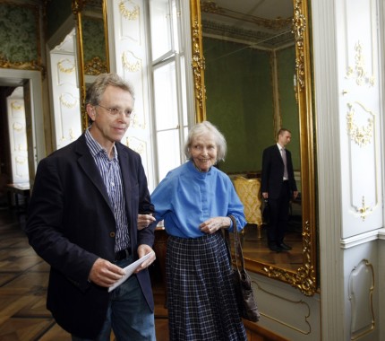 John and Geraldine Mucha John and Geraldine Mucha in front of an ornate mirror