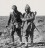Ottoman soldiers during the Balkan war two soldiers linking arms and walking through a barren landscape